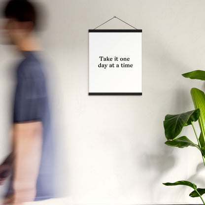 Poster with hangers take it