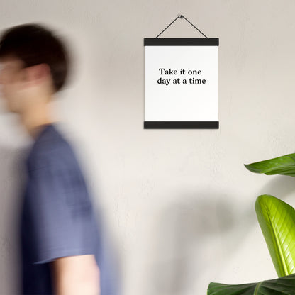 Poster with hangers take it